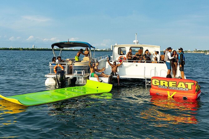 3 Hour Party Boat Jet ski Banana Tube and open bar in Miami - Drinks, music, and the party atmosphere