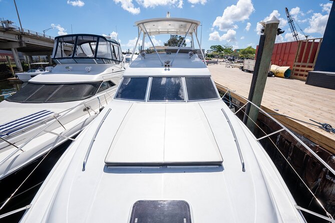 70ft + Free Hour | Miami Yacht Rental | 3 to 8 Hours | 13 ppl - Passing through Brickell and the Avenue Bridge