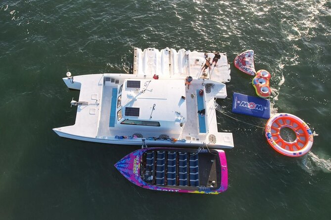 Aquatic Adventure: Boat Tour with Jetskis, Tubing, and Open Bar - The floating party platform