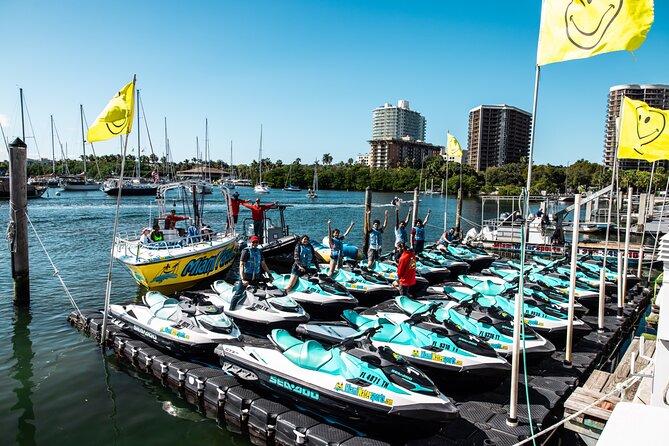 Banana Boat Tubing Ride with Miami Watersports - Holding on behind the 25-foot powerboat