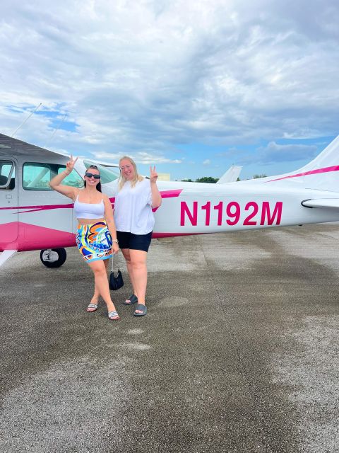 Miami: Downtown Private Airplane Tour with Soft Drinks - The Miami Seaquarium view and other sights