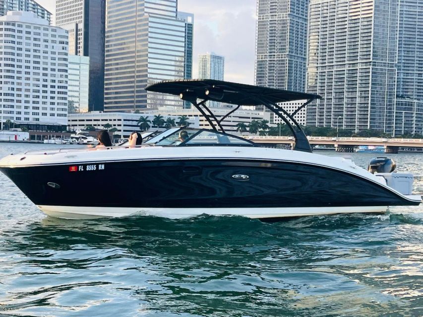 Miami: Guided Boat Tour with Champagne - Champagne, music, food, and swimming