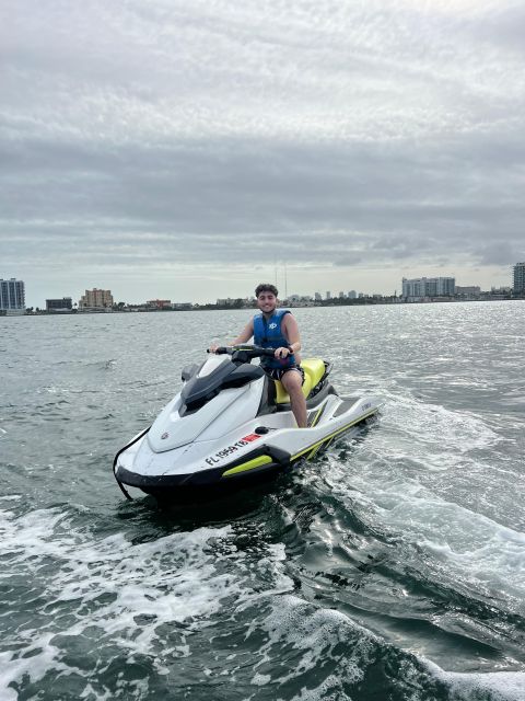 Miami: Miami Beach Jetski Ride with Boat and Drinks - Jet skiing beneath the Miami skyline