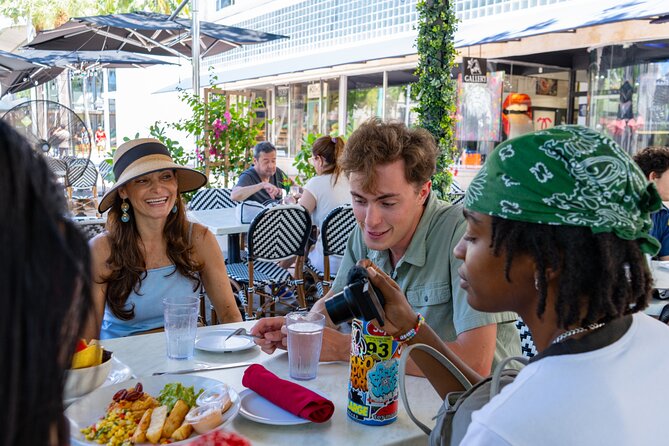 Savor South Beach: A Meal & Cultural Discovery - Lincoln Theatre: an Art Deco building with several lives
