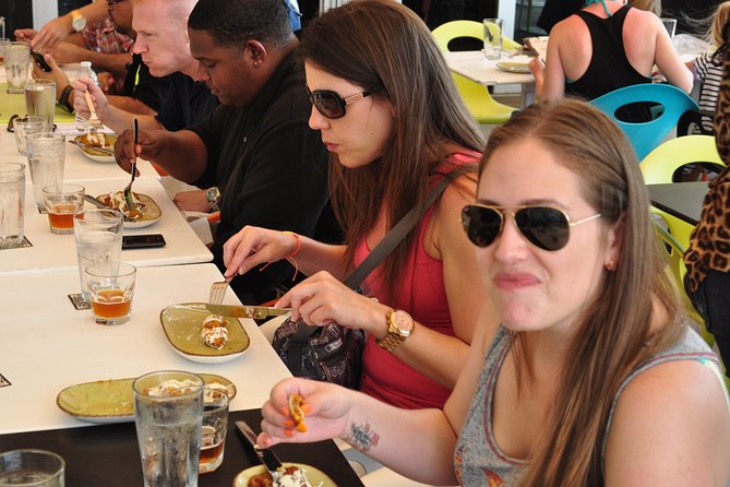 Wynwood Walls Art District Food Tour - A small group helps in a crowded district